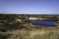 Contaminated pond lake of an old abandoned mining landscape for copper mining