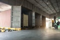 Contaner Trailer Trucks Parked Loading at Dock Warehouse. Shipping Cargo Container Delivery. Distribution Warehouse Logistics. Royalty Free Stock Photo