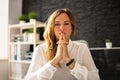 Contemplative Business Woman At Desk