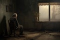 Contemplative old man sitting alone in front of the door. Home room Royalty Free Stock Photo