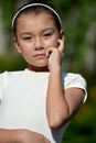 A Contemplative Petite Philippina Adolescent Closeup