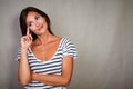 Contemplative woman standing with hand on head Royalty Free Stock Photo