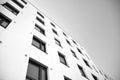 Contemporary apartment building. Generic residential architecture. Black and white.