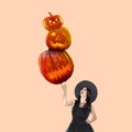 Contemporary art collage. Beautiful smiling witch holding creepy, scary Halloween pumpkins isolated on pastel background