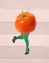 Contemporary art collage. Legs in green tights with tomato body. Dancing. Vegetarian. Healthy eating