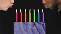 Contemporary art collage. Male lips blowing to rainbow colored burning candles in cake. LGBTQ support. Human rights