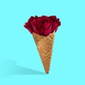 Contemporary art collage, modern design. Summertime mood. Icecream filled with beautiful red roses on light blue