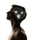 Contemporary artwork. Silhouette of young man with neon drawings of brain in his head. Artwork. Artificial intelligence Royalty Free Stock Photo