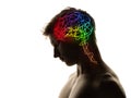 Contemporary artwork. Silhouette of young man with neon drawings of brain in his head. Artwork. Artificial intelligence Royalty Free Stock Photo