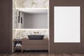 Contemporary bathroom with blank poster on brown wall Royalty Free Stock Photo