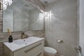 Contemporary bathroom design with taupe linear tiles accent wall