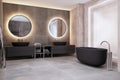 Contemporary bathroom interior with bath tub, illuminated round mirrors and black washbasins.