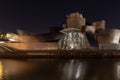 Contemporary building of the museum of Frank Gehry Guggenheim in Bilbao, Spain at night Royalty Free Stock Photo
