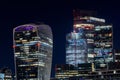 Contemporary building walkie talkie in the City of London at night