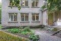 Contemporary classic European restored school building facade with windows