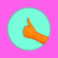 Contemporary collage. An orange human hand is depicted with a like gesture on a turquoise background in a round pink frame Royalty Free Stock Photo