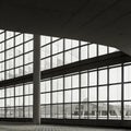 Contemporary Concrete Building Foyer with Glass Facade