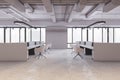 Contemporary concrete coworking office interior with window and city view, furniture, equipment and other items. Workplace and