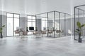 Contemporary concrete glass meeting room interior with furniture.