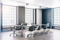 Contemporary concrete loft office with two window