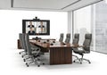 Modern conference room with video conferencing screen and executive chairs isolated on white background Royalty Free Stock Photo
