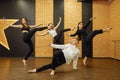 Contemporary dance performers posing in studio