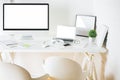 Contemporary desktop with pc and laptop Royalty Free Stock Photo