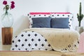 Contemporary eclectic bedroom, cross quilt