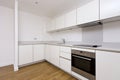 Contemporary fully fitted kitchen in white