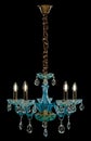 Contemporary glass blue chandelier isolated on black background. Royalty Free Stock Photo