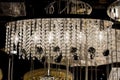 Contemporary glass chandelier isolated over black background Royalty Free Stock Photo