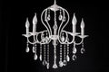 Contemporary glass white chandelier isolated on black background Royalty Free Stock Photo