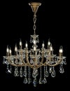Contemporary gold chandelier isolated on black background. Crystal chandelier Royalty Free Stock Photo