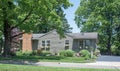 Contemporary Gray House with Flower Garden