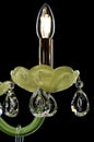 Contemporary green glass chandelier isolated on black background. close-up chandelier. Royalty Free Stock Photo