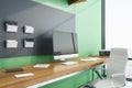 Contemporary green workplace with ÃÂomputer on table Royalty Free Stock Photo