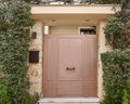 Contemporary house entrance metallic brown door, Athens suburbs, Greece Royalty Free Stock Photo
