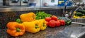 Contemporary kitchen with marble countertop, fresh produce on table, promoting healthy lifestyle