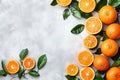 Contemporary kitchen with white quartz countertop, plant, oranges, and space for text