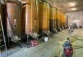 Contemporary large steel barrels in winery, food industry