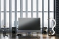 Contemporary light wooden designer workplace with empty mock up computer screen, loud speakers and other items. Window frame with Royalty Free Stock Photo