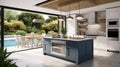 Contemporary luxury kitchen in modern house with open terrace and swimming pool Royalty Free Stock Photo