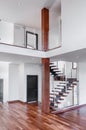 Contemporary Mahogany stairs new house with post and gallery