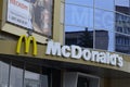 Contemporary McDonald`s Restaurant Exterior.McDonald`s fast food restaurant - window with logo