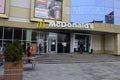 Contemporary McDonald`s Restaurant Exterior.McDonald`s fast food restaurant - window with logo