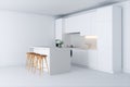 Contemporary minimalistic kitchen in new white interior Royalty Free Stock Photo