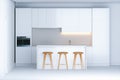 Contemporary minimalistic kitchen in new white interior Royalty Free Stock Photo
