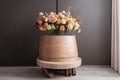 a contemporary minimalistic round wooden podium with a beautiful bouquet of flowers