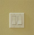 Contemporary modern electric light switches on wall. House home utilities interior details elements Royalty Free Stock Photo