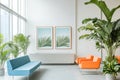 A contemporary office lobby features a waiting area adorned with plants, sunlight, and abstract artwork Royalty Free Stock Photo